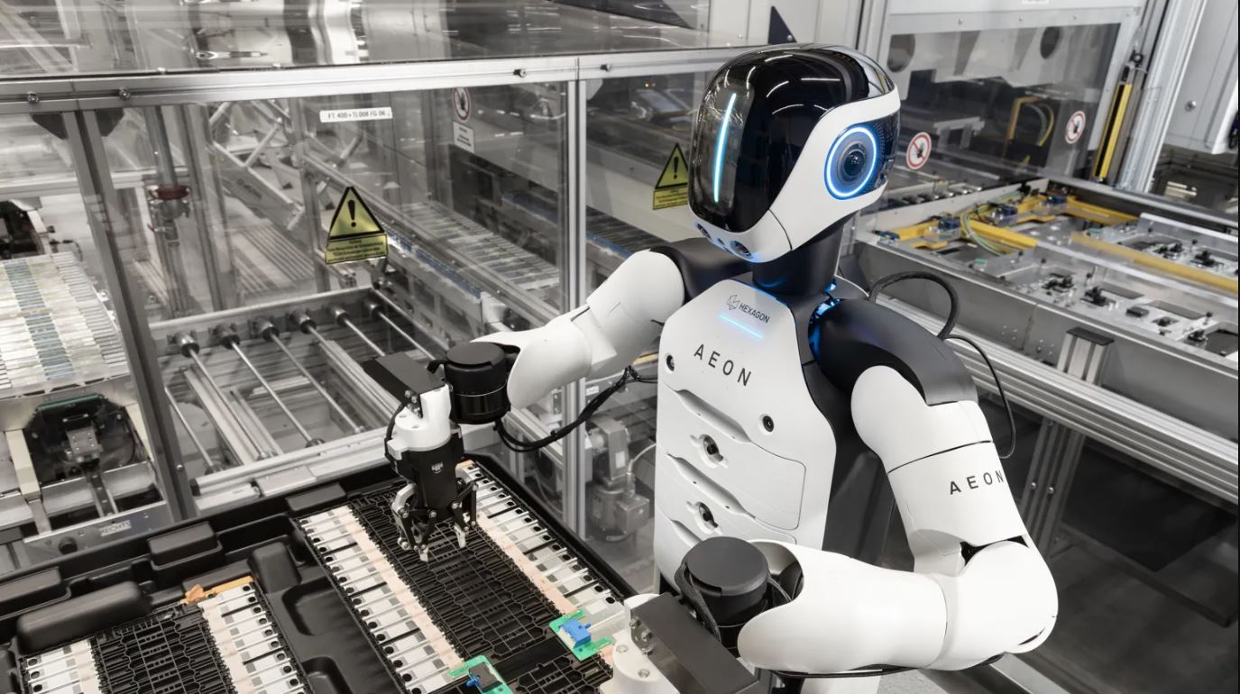 AEON humanoid robot working on battery assembly inside BMW’s automated car manufacturing factory.