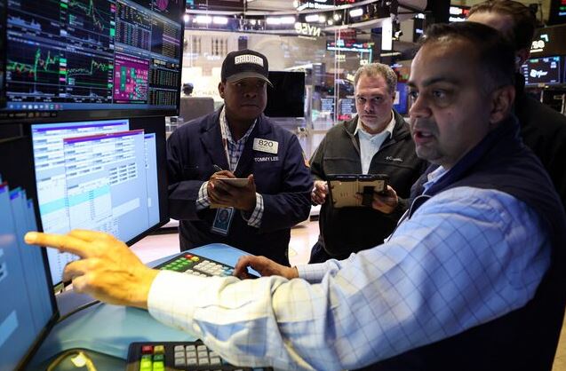 Stock traders monitor falling European markets after U.S. strikes on Iran triggered oil price and inflation fears