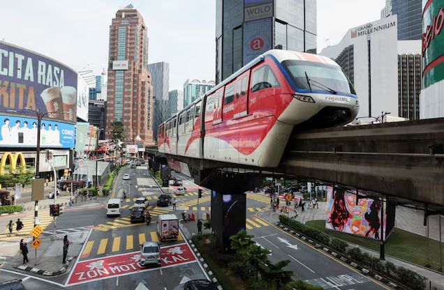 RapidKL monorail traveling through downtown Kuala Lumpur during Malaysia’s economic growth period in 2026