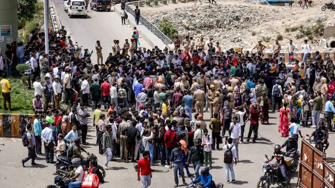 Noida labour protests: workers block roads as crowds gather demanding higher wages and better conditions