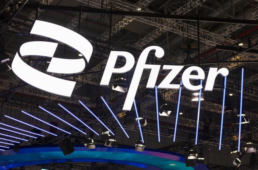 Pfizer logo displayed at a global healthcare and biotechnology conference highlighting AI-powered oncology research and precision medicine at ASCO 2026.