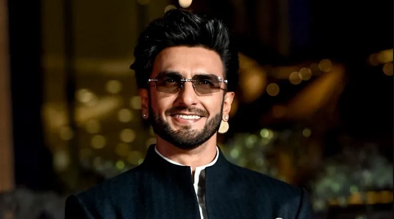 Ranveer Singh smiling during a public appearance amid the Don 3 controversy and FWICE boycott dispute.
