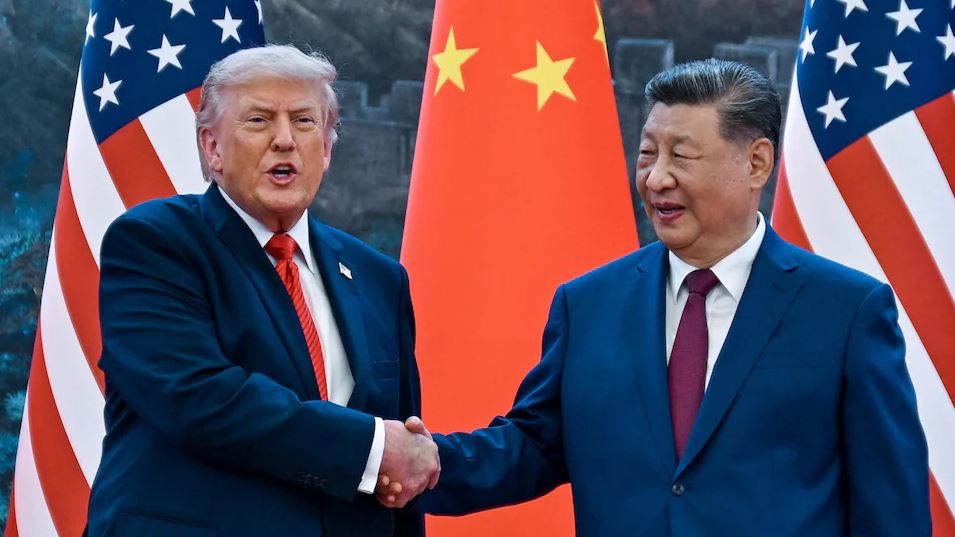 Trump and Xi Jinping shake hands during the high-stakes Beijing summit on U.S.-China relations.