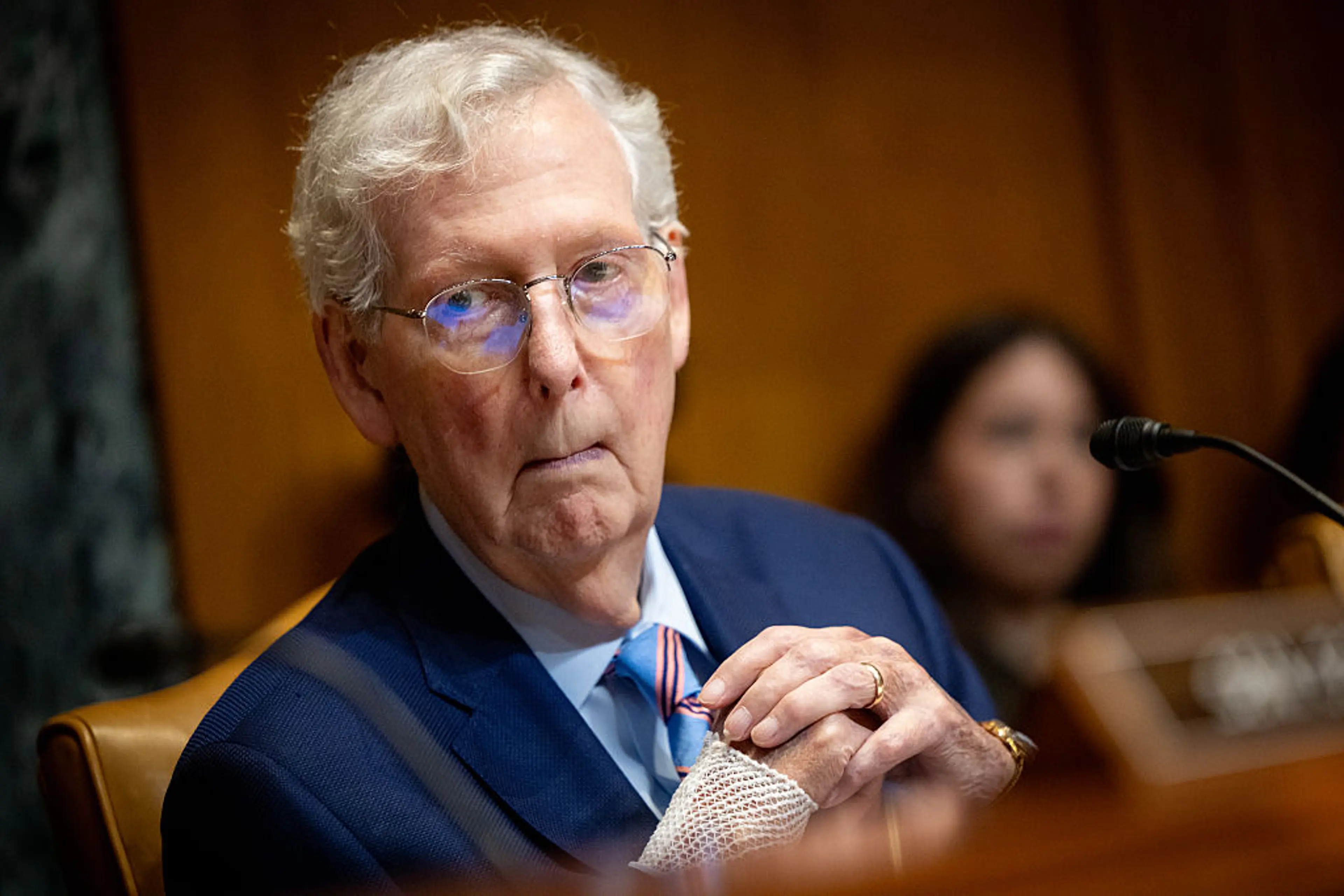 Mitch McConnell with bandaged hand at Senate hearing before his absence